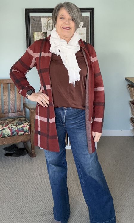 Plaid tunic sweater, wide leg jeans, brown satin top, cream scarf and suede pointy toe booties!  #winteroutfit #plaidtunic #suedebooties

#LTKover40 #LTKstyletip