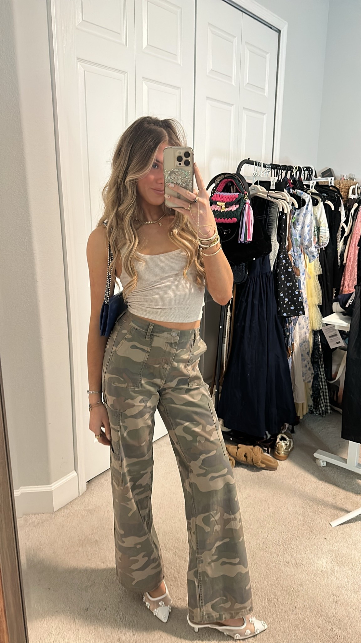 Outfit for the dinner Friday night dinner very trendy over here tonight lol wearing my new Walmart no boundaries wide leg camo cargo pants size 00 / extra extra small with my skims tank top in the cream size XS. Over the shoulders I have the Amazon Bianstore Women's Casual Long Sleeve Crewneck Button Down Cardigan Sweater Knit Outwear. I am wearing my new target kitten heels they are the Women's Delilah Mesh Floral Mule Heels - A New Day™ White. My purse is from Vivrelle my code is SLOANEVOSEN20! Jewelry is all the same normal jewels my code is SLOANE20 for electric picks  

#LTKStyleTip #LTKShoeCrush #LTKFindsUnder50