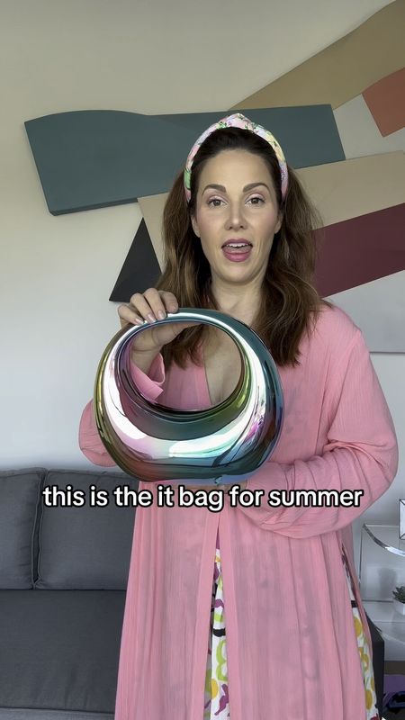 It bag of the summer! This acrylic moon shaped bag comes in many colors, including multicolor, silver, and gold chrome it is super cheap!! 

#LTKFindsUnder50 #LTKVideo #LTKItBag