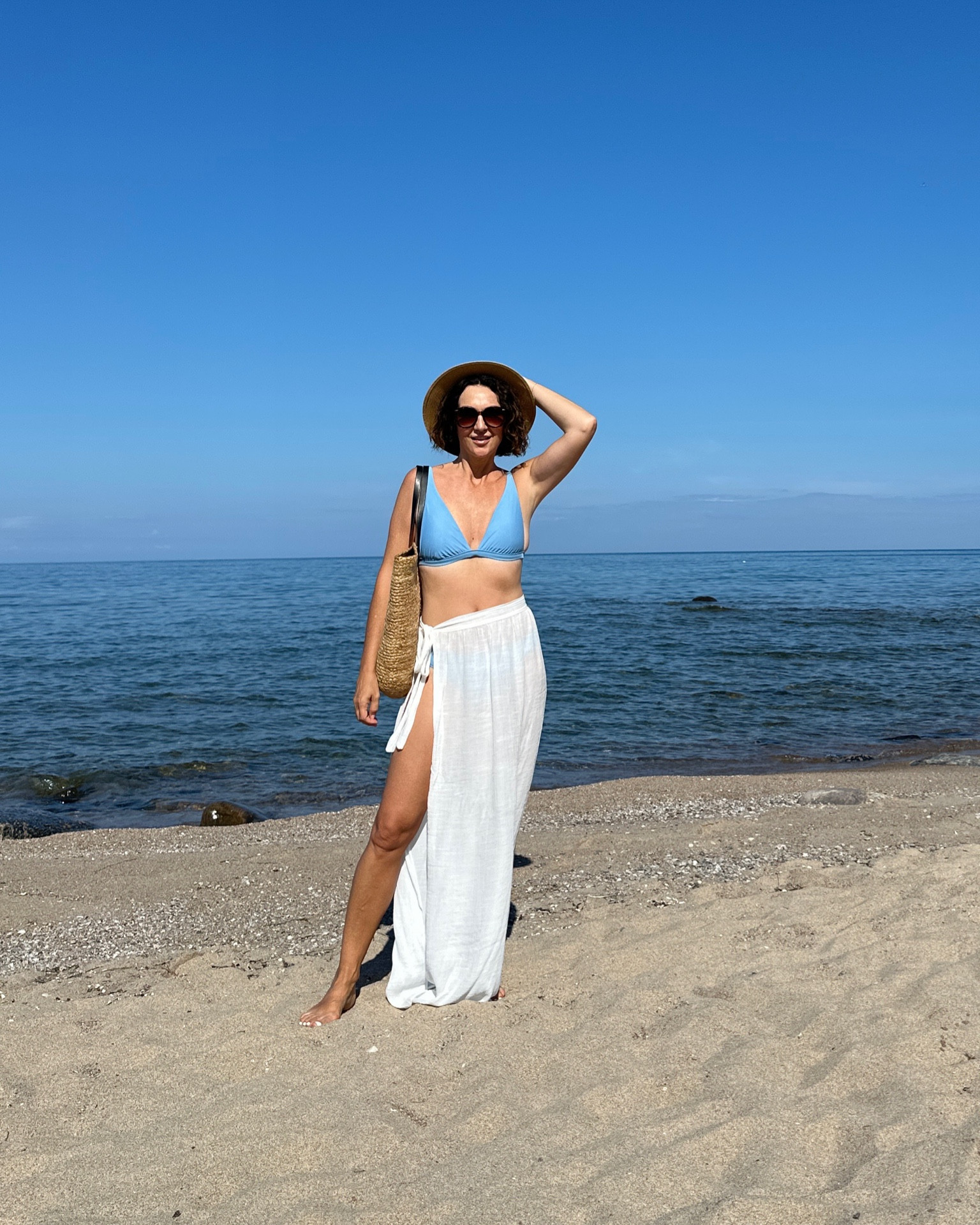 Beach fit! Linking my fave packable straw hat (I’ve had it for years and it always springs back to shape) and back cover up skirt, sometimes I wear it as a dress and you can buy one color or a set of two (I also got a khaki/linen shade)
My swimsuit is a few years old from Aerie, bag is also old, I linked similar 


#LTKStyleTip #LTKOver40 #LTKSeasonal