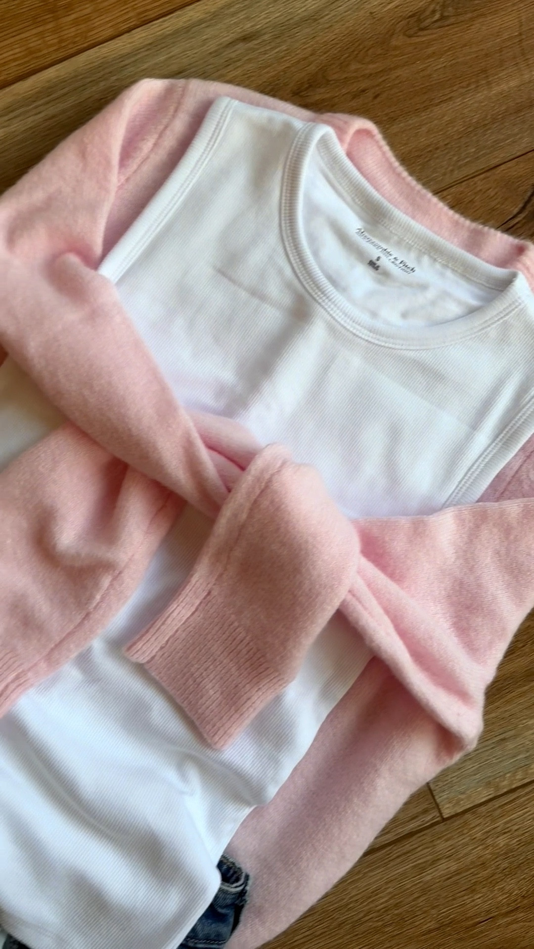 spring outfit. cardigan over shoulders trend. abercrombie outfit. 90s relaxed jeans. 

#LTKSaleAlert #LTKSeasonal #LTKTravel