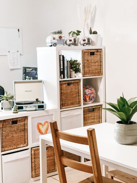 Functional wall to divide a space: cube storage shelf and some nice decor!

#LTKhome #LTKstyletip #LTKfamily