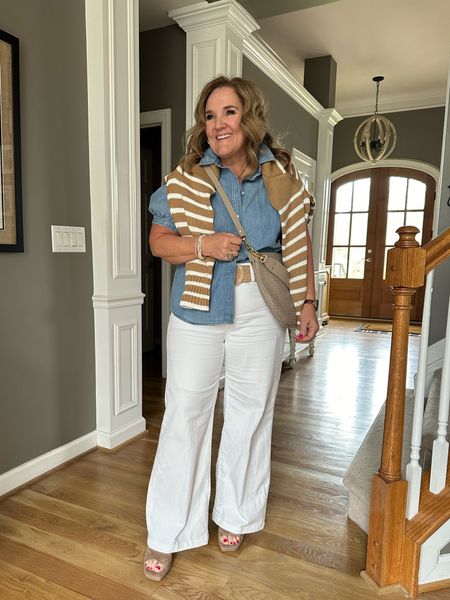 This sweater is on sale for $16. Crazy! It’s not lightweight but great cool summer nights or over your shoulders. The large fit. 

Jeans size 2.0. A lighter weight denim great for summer. 

I’ll link similar chambray blouses. 
Shoes 25% off with code MAY25

JCREW Chicos white jeans summer outfit summer sandals 

#LTKMidsize #LTKOver40 #LTKFindsUnder100