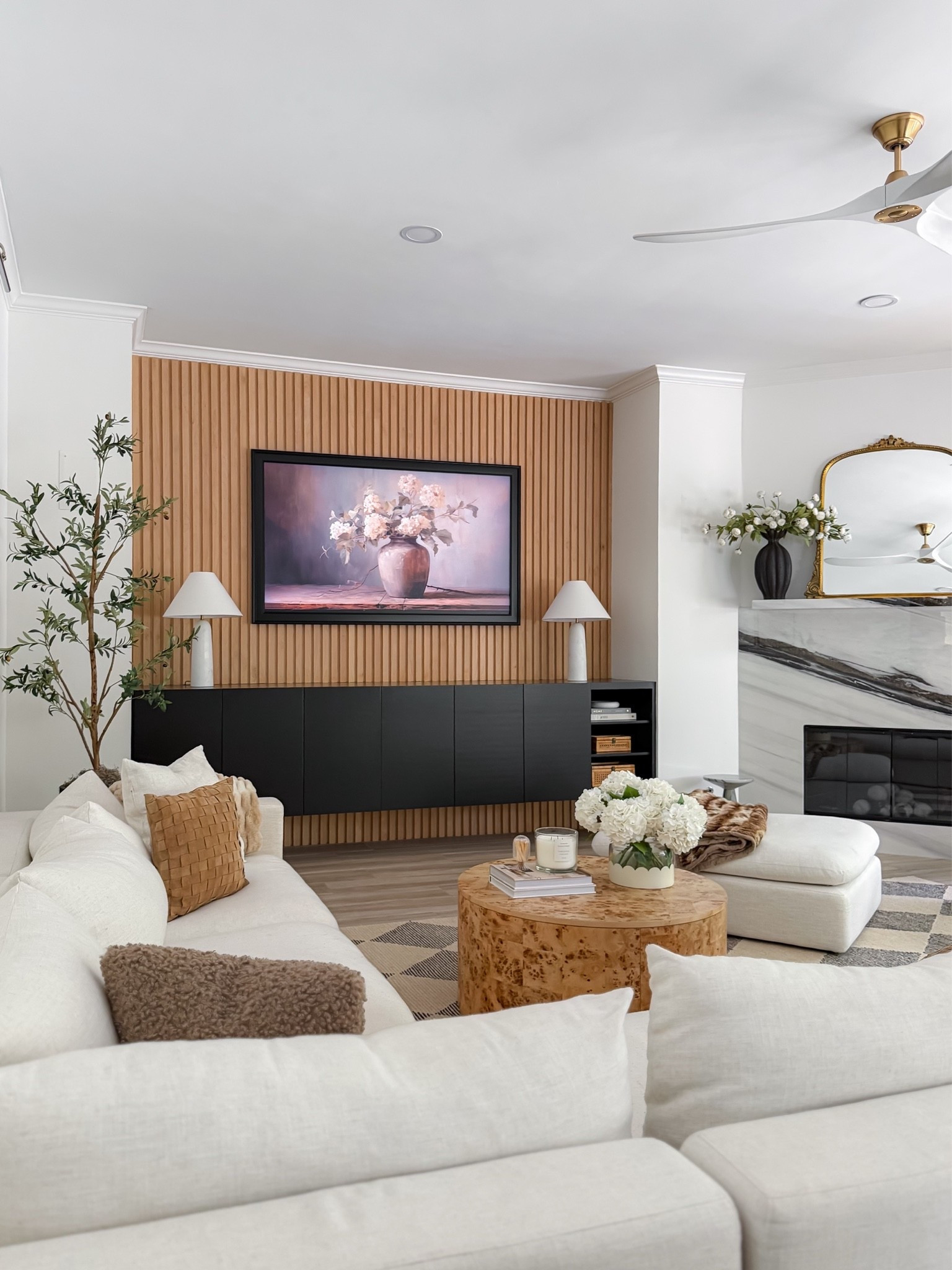 Yes—you absolutely can. 🤍 That’s exactly why I chose the Samsung Frame TV. I wanted a TV that could double as artwork instead of a giant black screen, and adding the  @DecoTVFrames frame gave it the custom, designer look I was after.

Pro tip: Turn on Art Mode, lower the brightness, and increase the warmth of your artwork. Those three settings make the biggest difference in helping it look like a real framed piece instead of a TV.