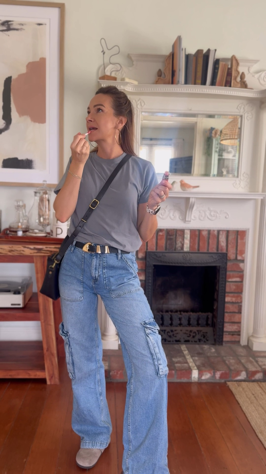 When husband says you look cute in his T-shirt, you wear his T-shirt. This is how I styled an oversized gray t shirt. Honestly, I feel like I’m in high school lol it’s such a cute look with the baggy cargo jeans that I absolutely love. The black belt and black leather purse go great together and these comfortable flat clogs are perfect for fall.

#LTKShoeCrush #LTKFindsUnder100 #LTKStyleTip