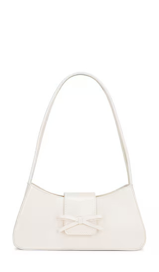 petit moments x REVOLVE Bow Bag in White. | Revolve Clothing (Global)