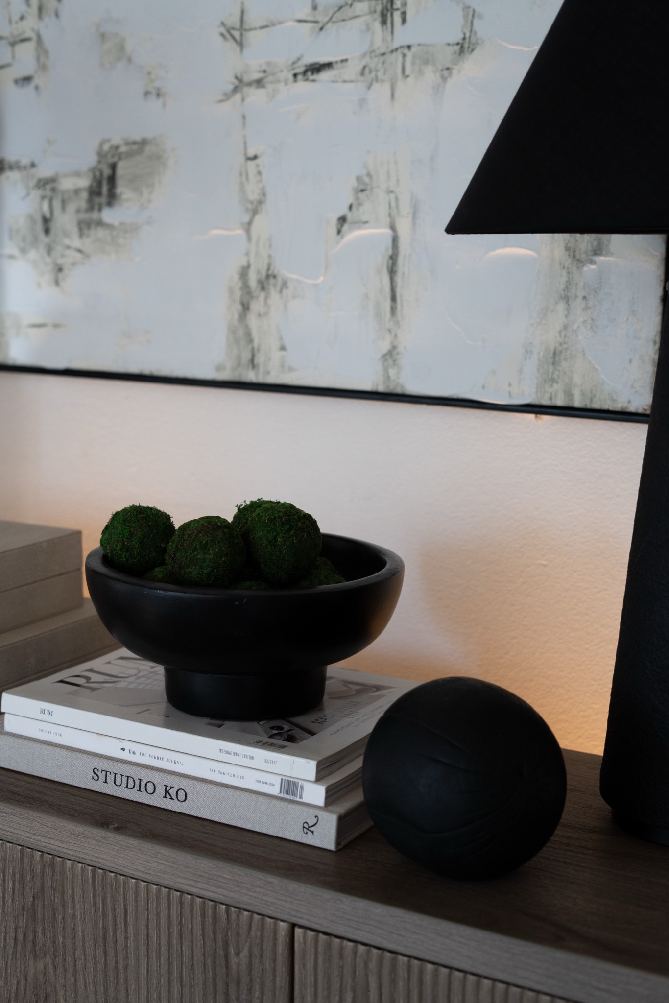 Awkward spaces can be a challenge but with a few hacks like these slim cabinets, oversized art, and greenery and a rug a space can really be brought to life!

#LTKStyleTip #LTKHome #LTKMostLoved