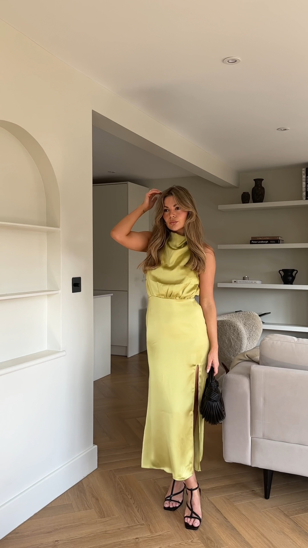 This stunning yellow silk dress paired with black strappy heels and a black bag. 

Such a gorgeous dress! 



#LTKunder50 #LTKwedding