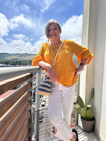 Easy breezy gold peasant top, white jeans, water shoes and straw bag  #travelinginitaly #casualwear #watershoes 

#LTKTravel #LTKOver40 #LTKStyleTip