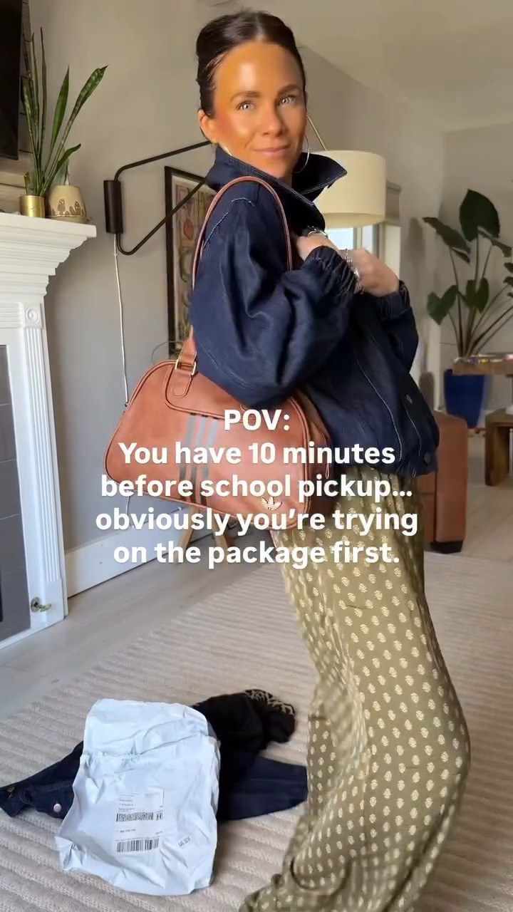 Tell me I’m not the only one…😬 A package gets delivered and suddenly it feels like Christmas. I got home and had 10 minutes before school pickup, so of course I tried it on immediately.

This set is technically pajamas, but I’ll absolutely be wearing it out this spring and summer.

The funnel neck denim jacket is also a yes. And of course, we love to keep it sporty chic so this bag is the cherry on top!

5’3
XS in everything!

#LTKActive #LTKootd #LTKmomlife