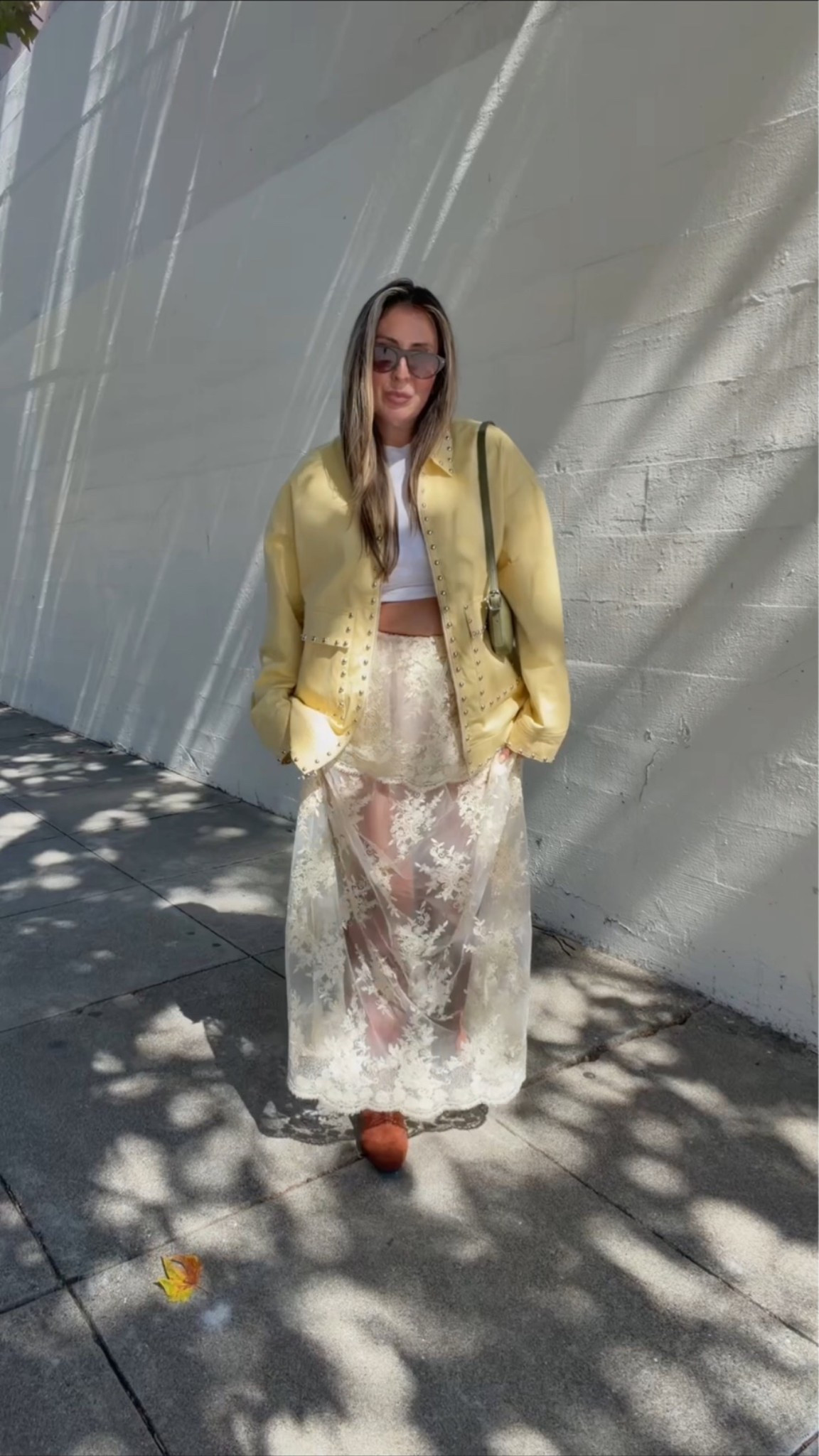 outside lands festival outfit

staud studded jacket
old navy tee
revolve skirt