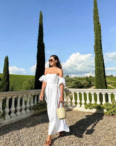 Kat Jamieson wears a white off the shoulder dress in Tuscany. What to wear in Italy, summer outfit, summer dress. 

#LTKSeasonal #LTKitbag #LTKtravel