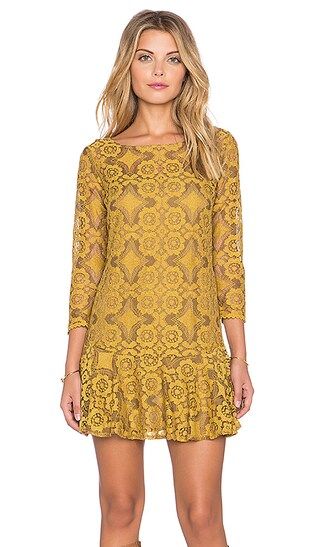 http://www.revolveclothing.com/free-people-walking-to-the-sun-dress-in-dandelion/dp/FREE-WD933/?d=Wo | Revolve Clothing