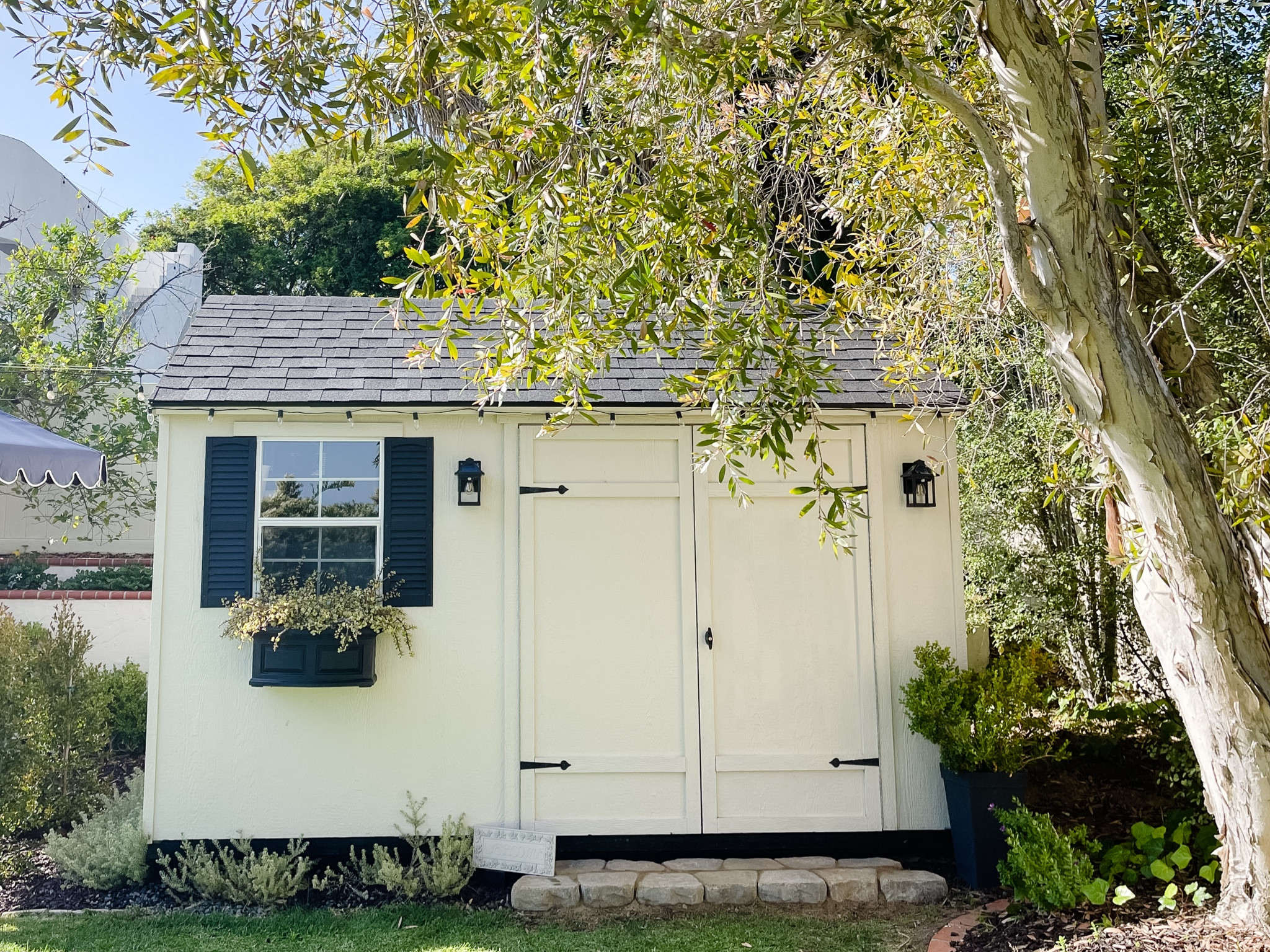 Make your shed charming, even without power!  Everything linked from solar lights to window boxes and the flooring inside. If you have power nearby, the white lights around the trim are charming!

#LTKhome