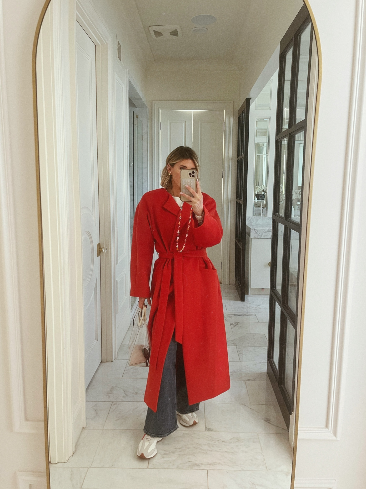 What I wore to the chiefs game! This coat is so warm and stunning. I'm 5'7 and wearing size small