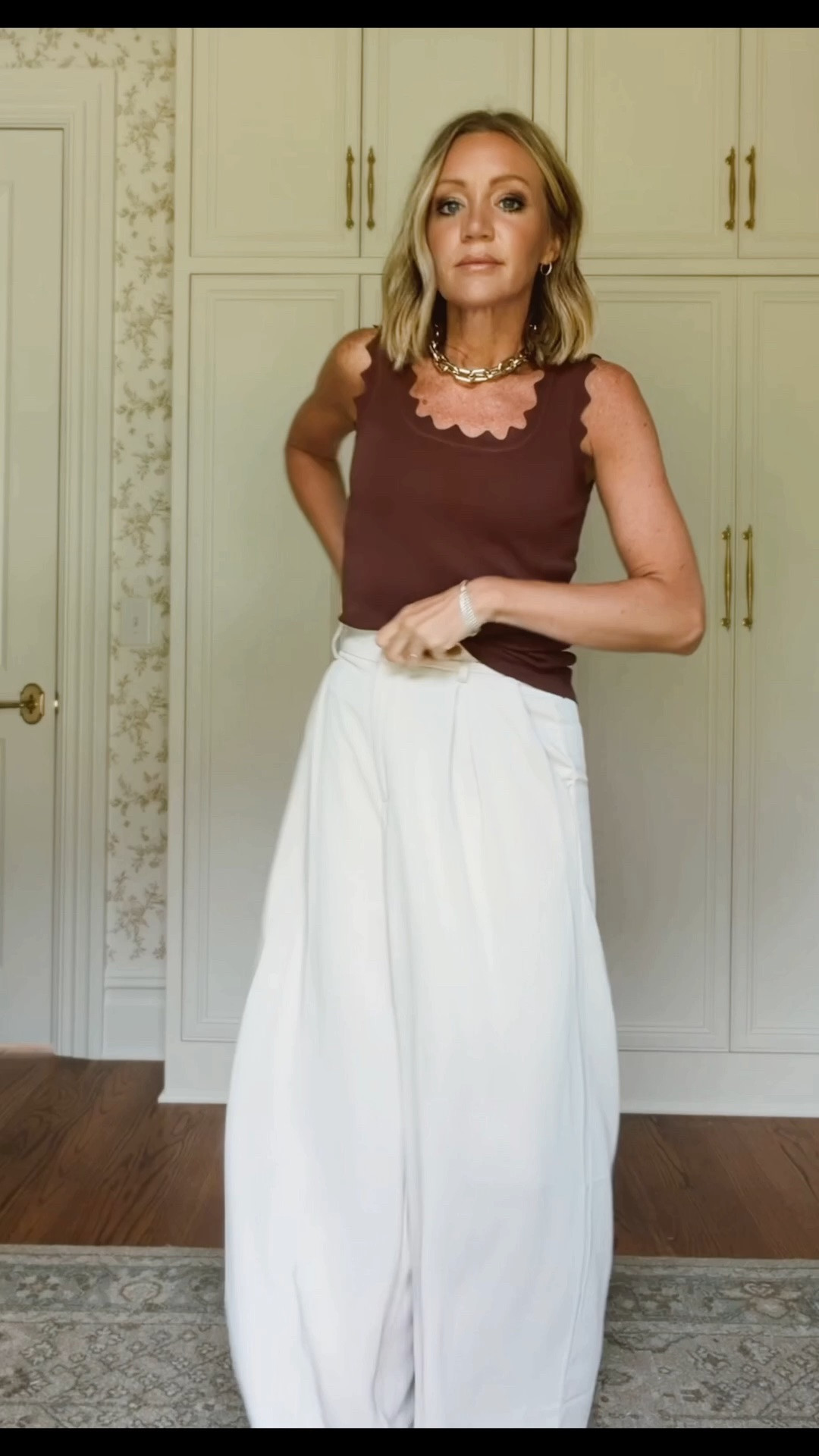 Small in tanks and pants
Color of pants is called beige short but this is the S regular length