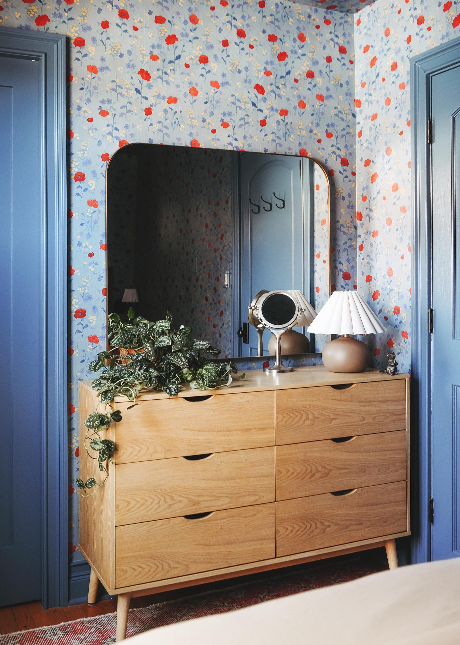 The large mirror does a beautiful job bouncing light around the room, and the addition of this small table lamp provides the softest glow in the evenings 

#LTKHome