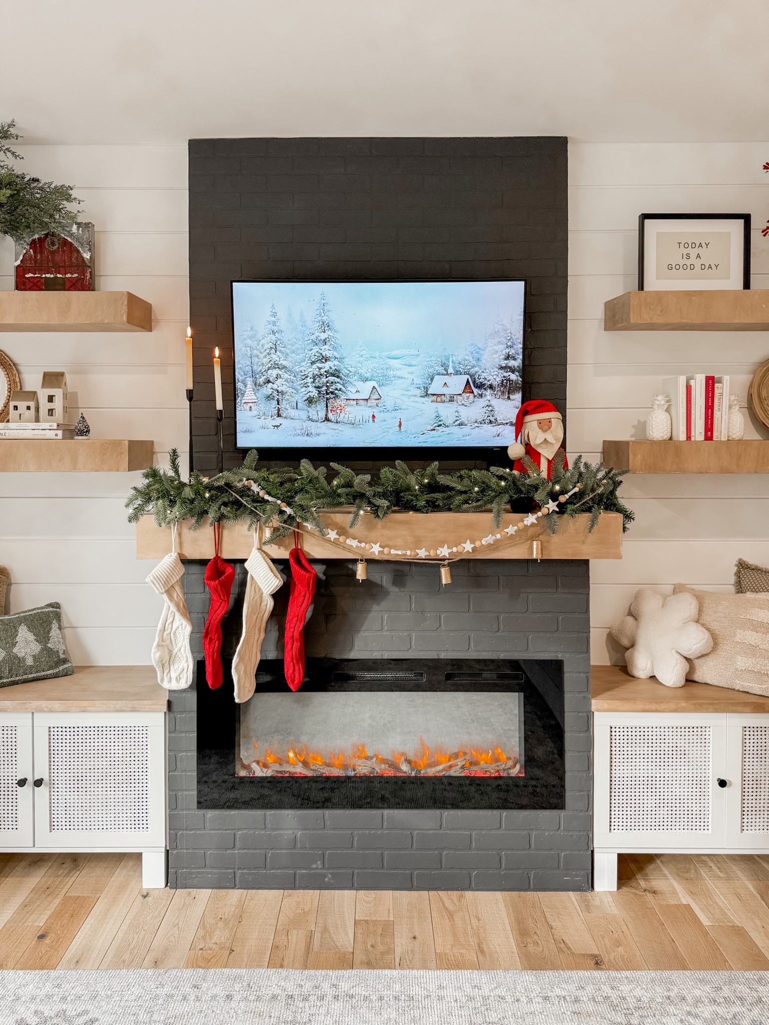 Christmas mantel decor ✨

The gold cowbell garland is from Hobby Lobby. I linked a similar one from Amazon. Wooden stars & felt Santa are from a local shop. Everything else is linked!! 🎅🏼🎄✨ 

#LTKHome #LTKSeasonal #LTKHoliday
