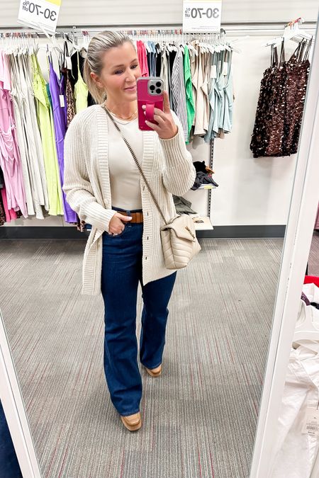 Running errands outfit. These high rise flare jeans are SO comfortable. They run a bit generous but wearing my true size 27 in the regular length. They’re long! If I wanted to wear a flag or a low heel I would need the short.

Bodysuit medium
Cardigan small and reviews are true. It does run a bit generous but I love this oatmeal color. 

#LTKSeasonal #LTKfindsunder50 #LTKfindsunder100