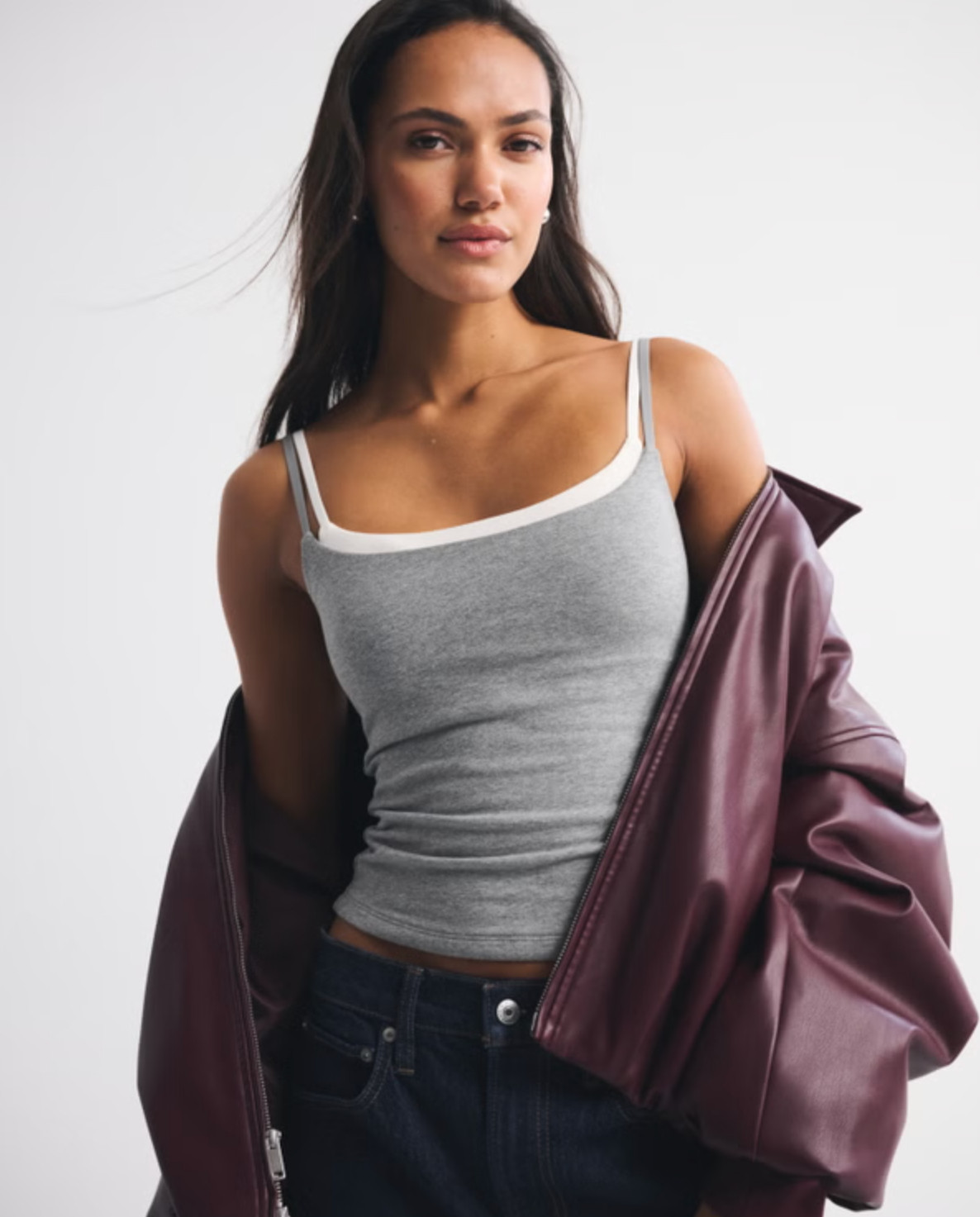 An everyday staple you’ll reach for constantly 🤍 The Abercrombie Bra-Free Double-Layered 90s Cami is part of their bra-free collection with removable pads for easy coverage and support. Made in their ultra-soft cotton-blend seamless fabric, it has that perfect 90s-inspired fit with a flattering square neckline and double-layer design. So easy to style with denim, skirts, or under layers for a clean, seamless look ✨ 

 #LTKSpringSale #LTKootd #LTKSaleAlert