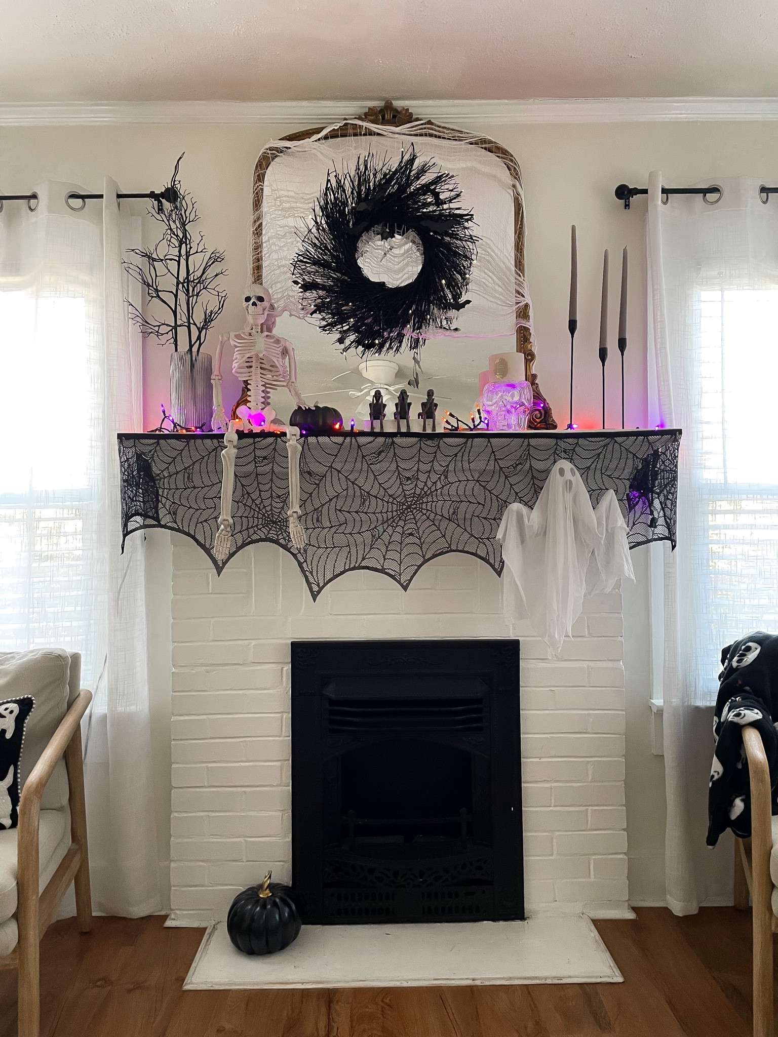 Halloween mantle decoration

Candles, skeleton, pumpkin, skull, spooky, bats, ghost, black, spider web, decoration, seasonal 

#LTKhome #LTKstyletip #LTKSeasonal