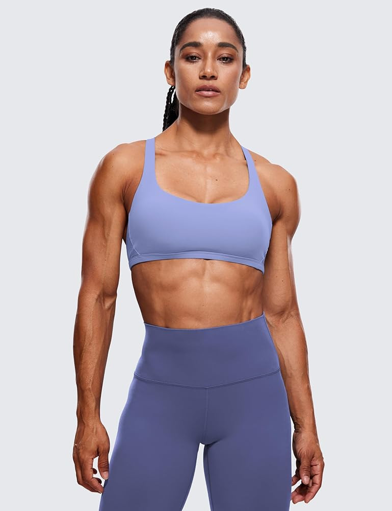 CRZ YOGA Womens Strappy Sports Bra - Criss Cross Back Padded Medium Support Wireless Gym Cami Wor... | Amazon (US)