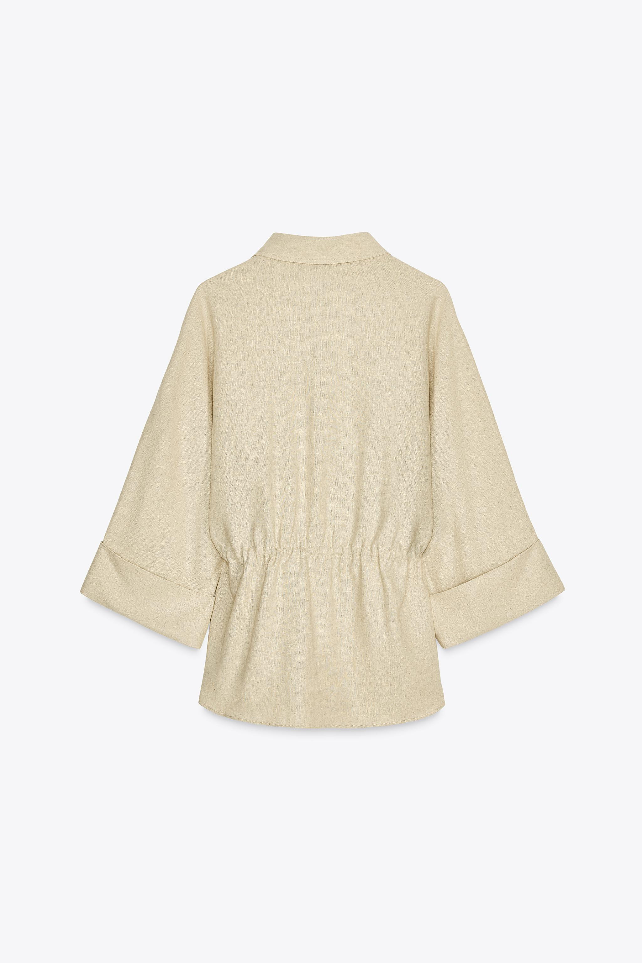 Linen shirt. Lapel collar and wide sleeves with cuffs. Adjustable drawstring waist. Front closure... | Zara US
