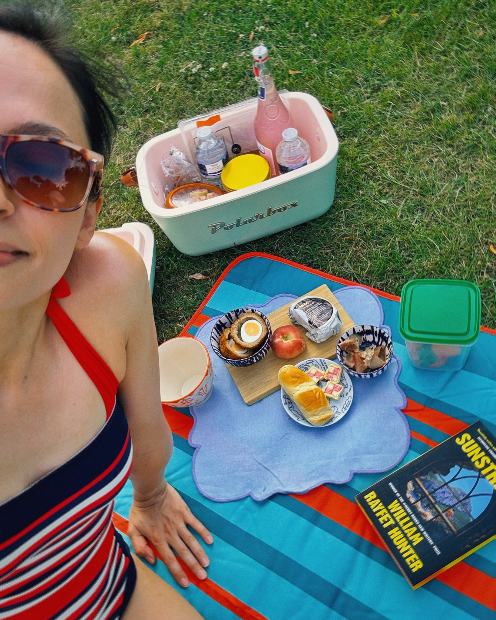 First picnic of the year! ☀️ new book, new cool box, new blanket, very old & trusted swimsuit! 😬 I’m so picky about swimwear & I always go back to this one when I just want to feel comfortable - great coverage all over and it stays put if you let the neckties down to get a nice tan :) So glad they brought this colourway back, it’s the best! (I’m wearing a size 8 regular in this - Adele is wearing size 8 regular in her other style). Here’s to many more al fresco summer moments! 

#LTKuk #LTKsummer #LTKswimwear