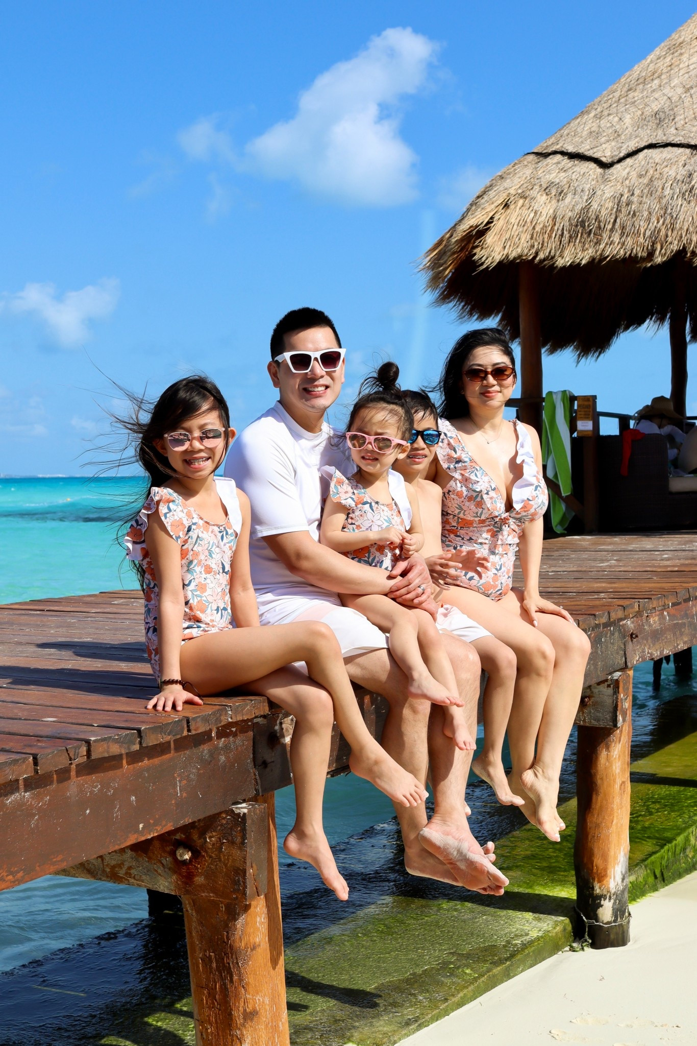 Family Matching Swimsuits // Super cute orange matching family swimsuits with ruffle trim neckline in a floral print and orange for the girls and white block shorts for the boys. Fits TTS.

#LTKmomlife #LTKSwim #LTKKids