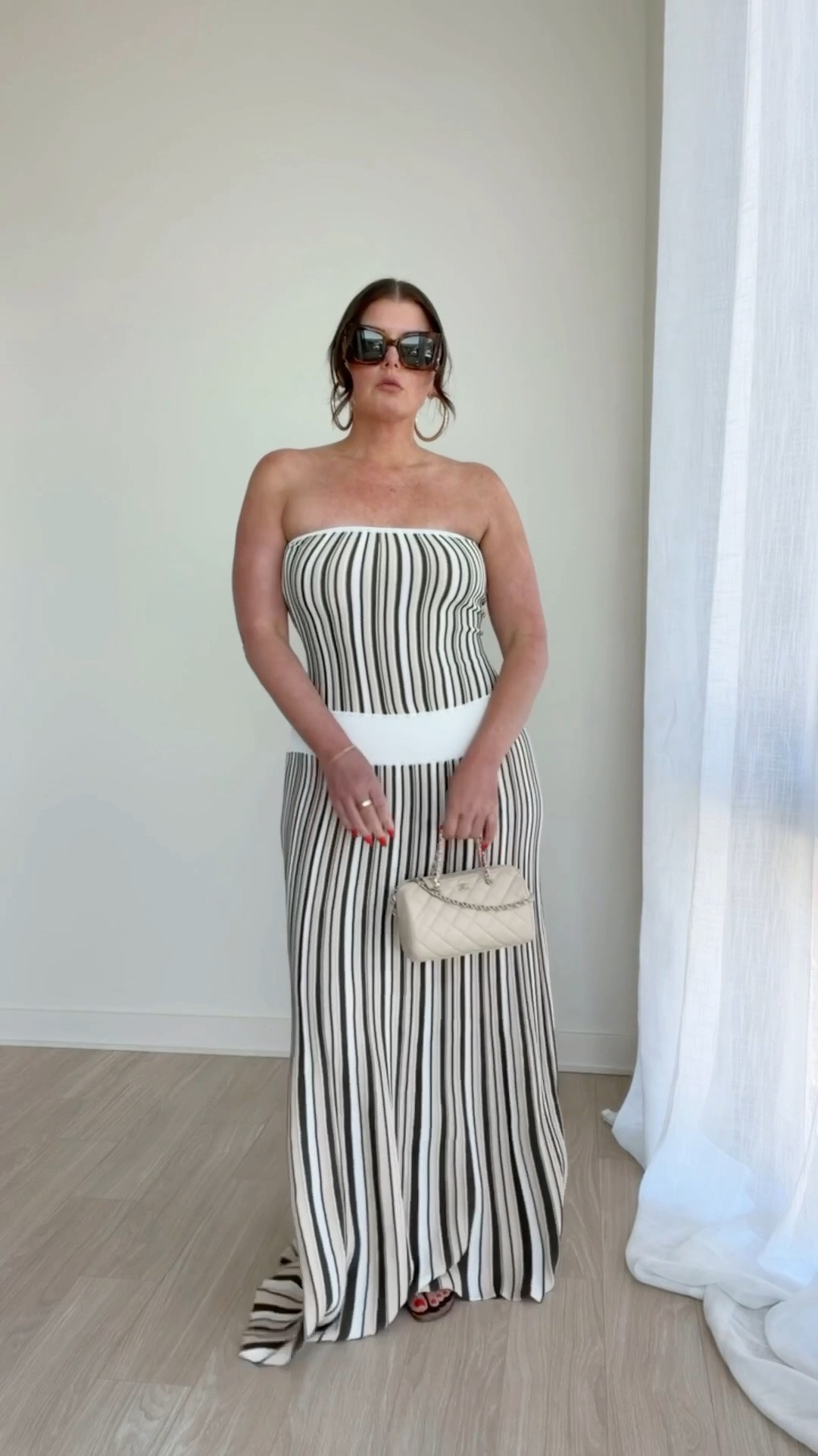 I always size up in Aritzia bottoms, I sized up in the top too for more side coverage.

Both dresses run true to size