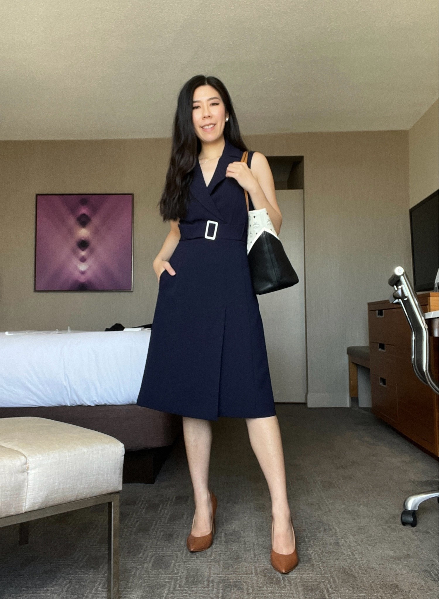 If you know anything about me, it’s that I love the convenience of a dress for conferences. I don’t have to think about what matches it and accessories are pretty easy if I already have the base of the outfit. For this blue sleeveless lapel dress, I wanted something classy and preppy so I went for brown heels. As an accent, I wore my tri-colored chevron tote.

#corporatestyle #sleevelessdress #9to5style #businesscasual

#LTKootd #LTKPetite #LTKWorkwear