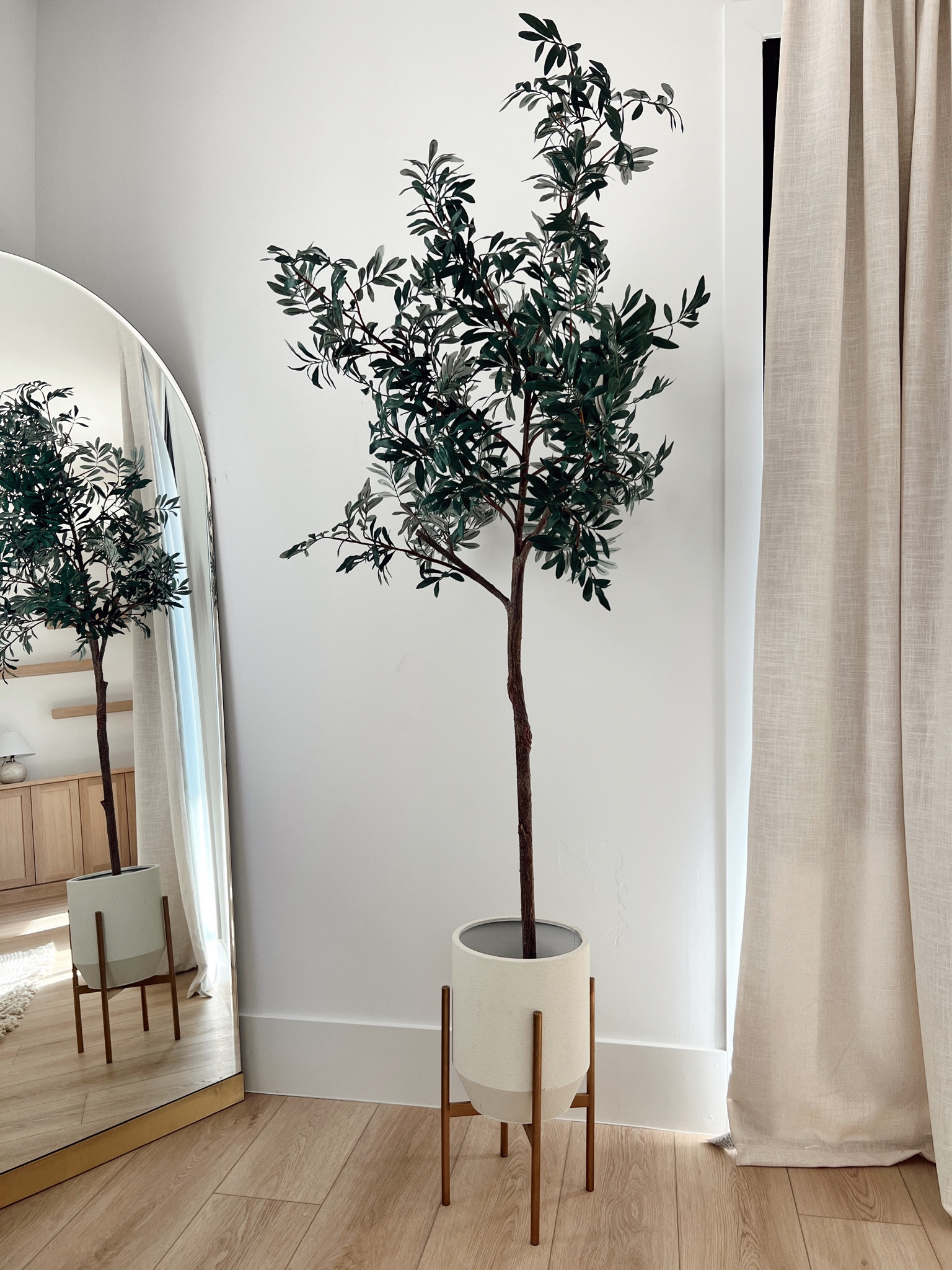Faux olive tree and planter  both on sale! 

#LTKFind #LTKsalealert #LTKhome