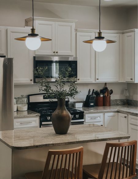 Modern vintage pendant lighting in oil rubbed bronze and brass. Simple kitchen decor that’s functional and beautiful. All affordable as well! Amazon lighting. Target home and kitchen  

#LTKStyleTip #LTKHome