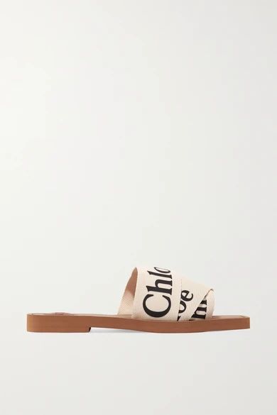 Chloé
				
			
			
			
			
			
				Woody logo-print canvas slides
				$350 | NET-A-PORTER (US)