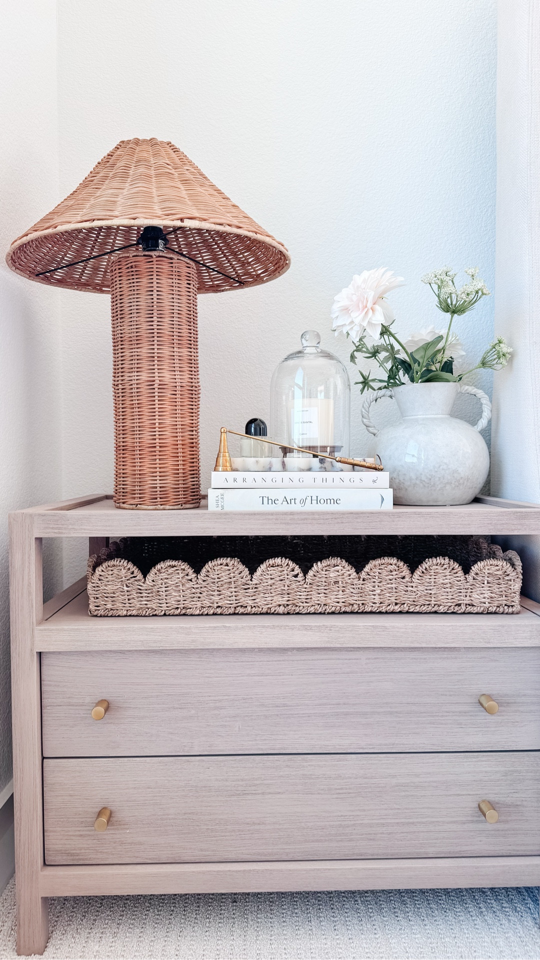 Nightstand styling but make it cozy + elevated 🤍 I’m obsessed with how this simple bedside refresh turned out — the woven rattan lamp adds the perfect warm texture, and the stacked books + tray make it feel designer without being cluttered. Everything is linked for easy shopping (lamp, nightstand, vase, florals, tray + decor accents) and this look works in any neutral bedroom, guest room, or modern organic home style.

#LTKFindsUnder100 #LTKdayinmylife #LTKHome