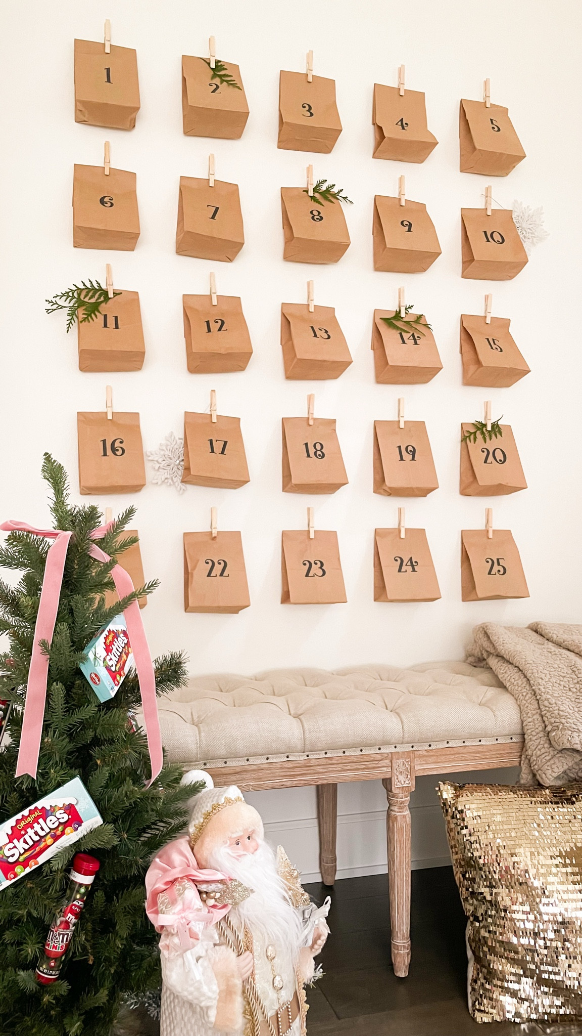 DIY advent calendar! 📆🎁 Time consuming but so cute and you can fill the paper bags with anything you want! 

Circuit cardstock, wooden clothespins, picture hanging stripes, glass jars, brown papers. 


#LTKHome #LTKHoliday #LTKFindsUnder100