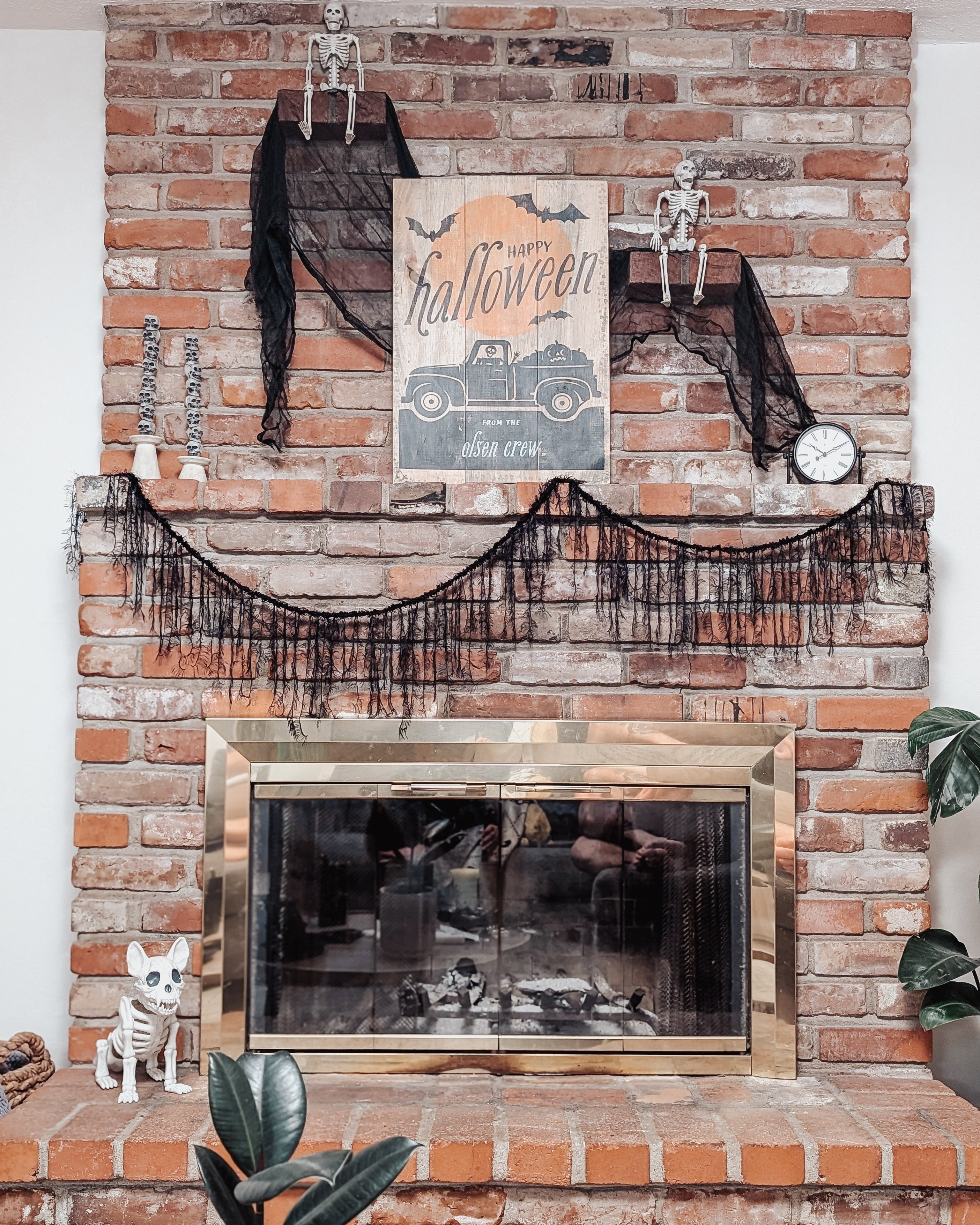 Adding a little spooky fun with skeletons and Halloween garland to my brick fireplace as we move into the fall season! 

#LTKSeasonal #LTKHome #LTKFindsUnder50