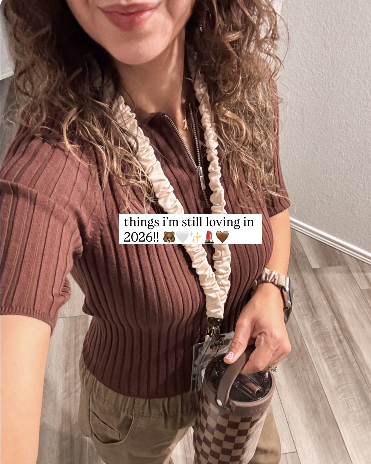 things i’m still loving in 2026!! 🐻🤍✨💄🤎

andi scrunchie lanyards, longchamp tote bag, checkered hydrojug, studded boots, sacheu lip stain and l’oréal lip oil, nex playground, cc creme, plaid flannel, leggings, ankle socks, andi scrunchie apple watch band, bath and body works candle