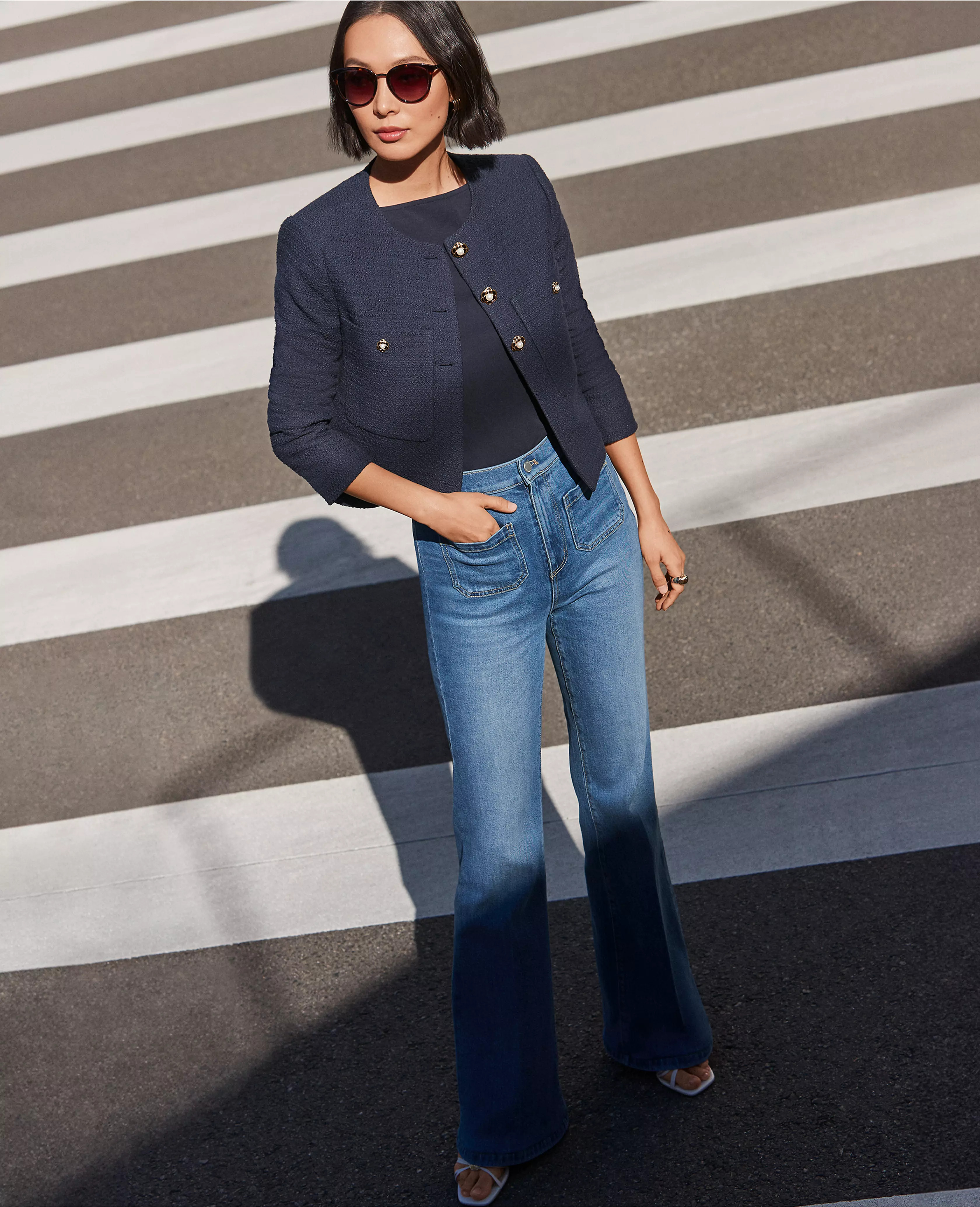 Petite High Rise Patch Pocket Flare Jeans in Bright Medium Stone Wash | Ann Taylor (US)