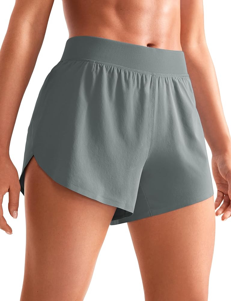 CRZ YOGA Mid Waisted Dolphin Athletic Shorts for Women 4" Lightweight High Split for Gym Workout ... | Amazon (US)