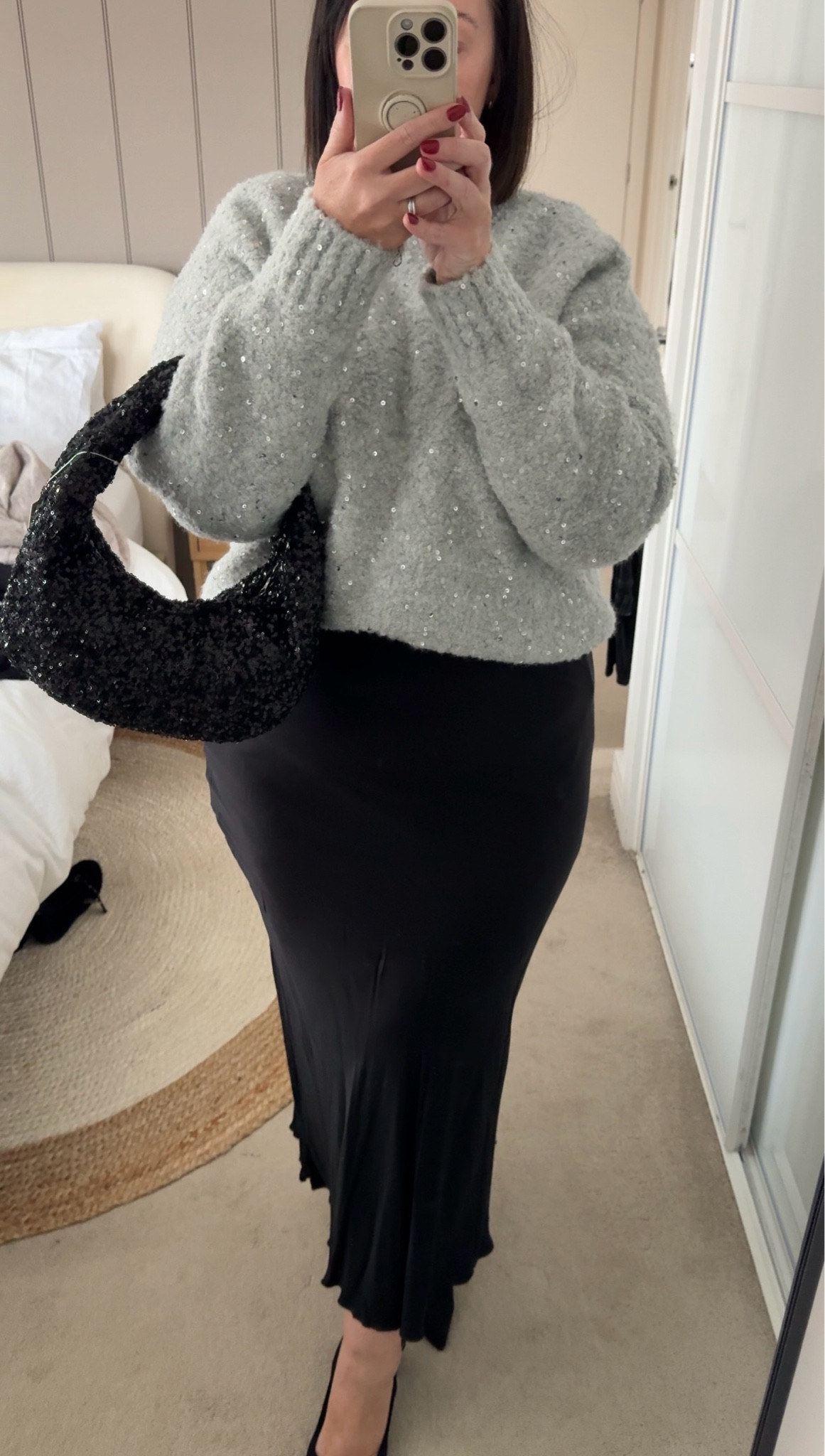 Party season but make it cosy! Mid size fashion. 

Satin skirt, sequin bag, sequin boucle jumper. 

#LTKuk #LTKcurves #LTKmidsize