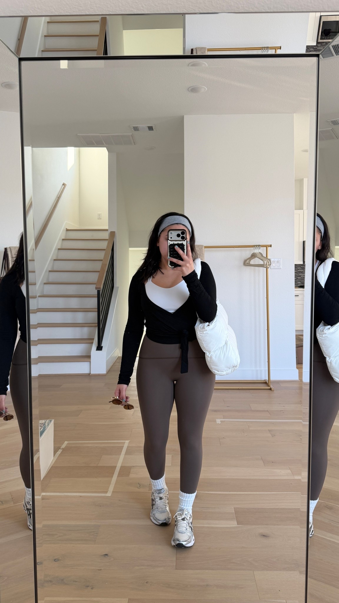 Gym outfit 
Wrap top: small
White sports bra: 2 
Leggings: small 
Sneakers: 6.5 women 
Puffer tote bag 
Gym bag 
Gym headband 
Sunglasses 

#LTKootd #LTKActive #LTKdayinmylife