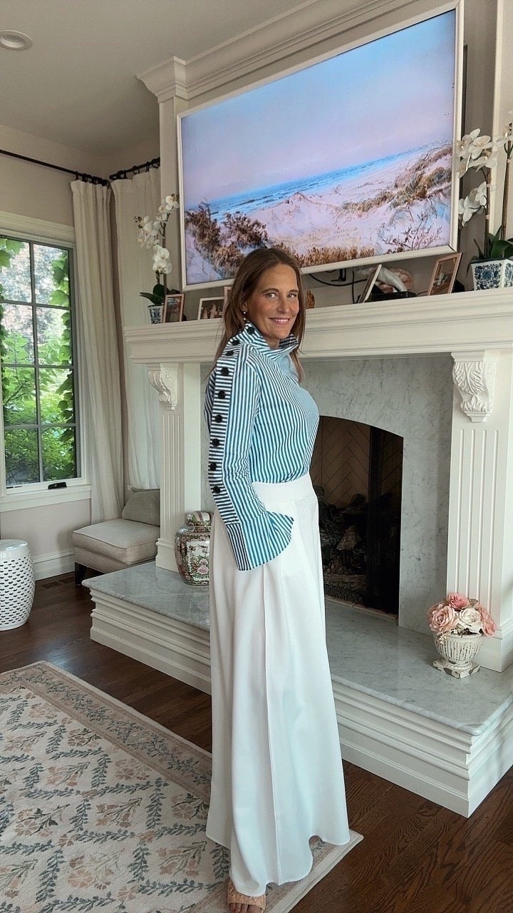 This is such a fun top to wear to work or for a teacher look! This striped top with button detail down the arm is such a statement piece! I paired it with white trousers and gold Ross simons jewelry! 

#LTKOver40 #LTKSeasonal #LTKMidsize