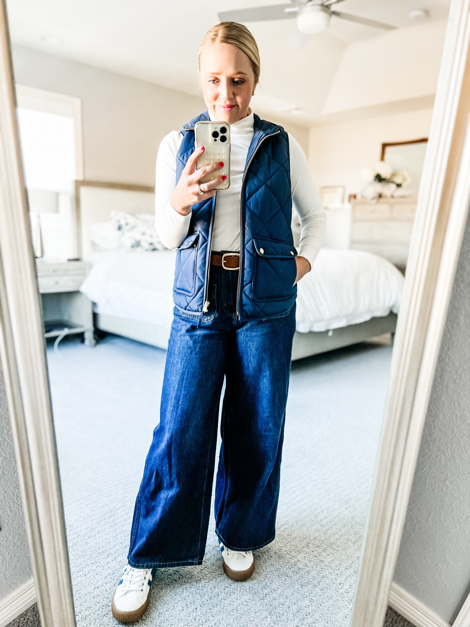 Petite trouser jeans paired with a quilted vest and gola sneakers. Almost an identical petite style at Gap to these wide leg jeans from old navy. I wear 27 short (4p). Exact suede belt and turtleneck. Similar sneakers, flares, and navy vest. 
Petite, winter outfit, wide leg jeans, petite outfit, quilted vest, gola sneakers 

#LTKPetite #LTKSaleAlert #LTKFindsUnder100