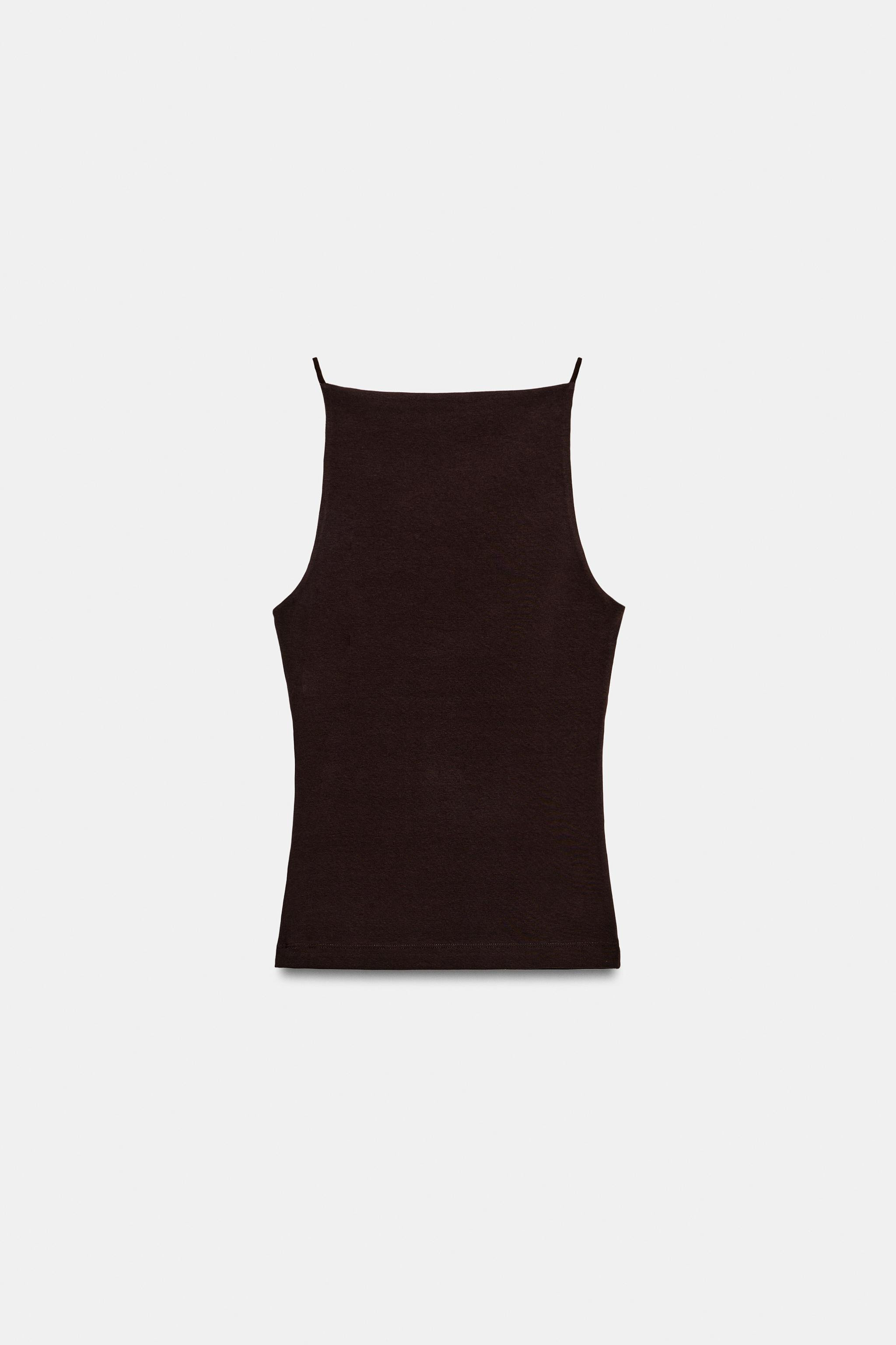 Model height: 178 cmTop crafted from a cotton blend fabric. Featuring a straight neckline, thin s... | Zara DE