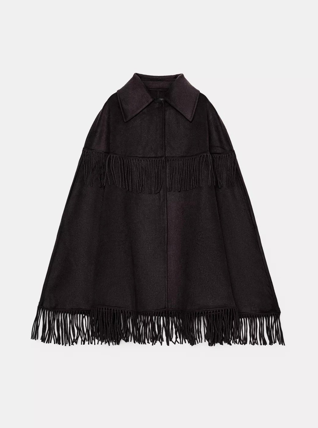 Wool cape, fringe cape. Would layer this over a gray long sleeve tshirt an pair this with some vintage Levi’s. 

#LTKStyleTip #LTKSeasonal