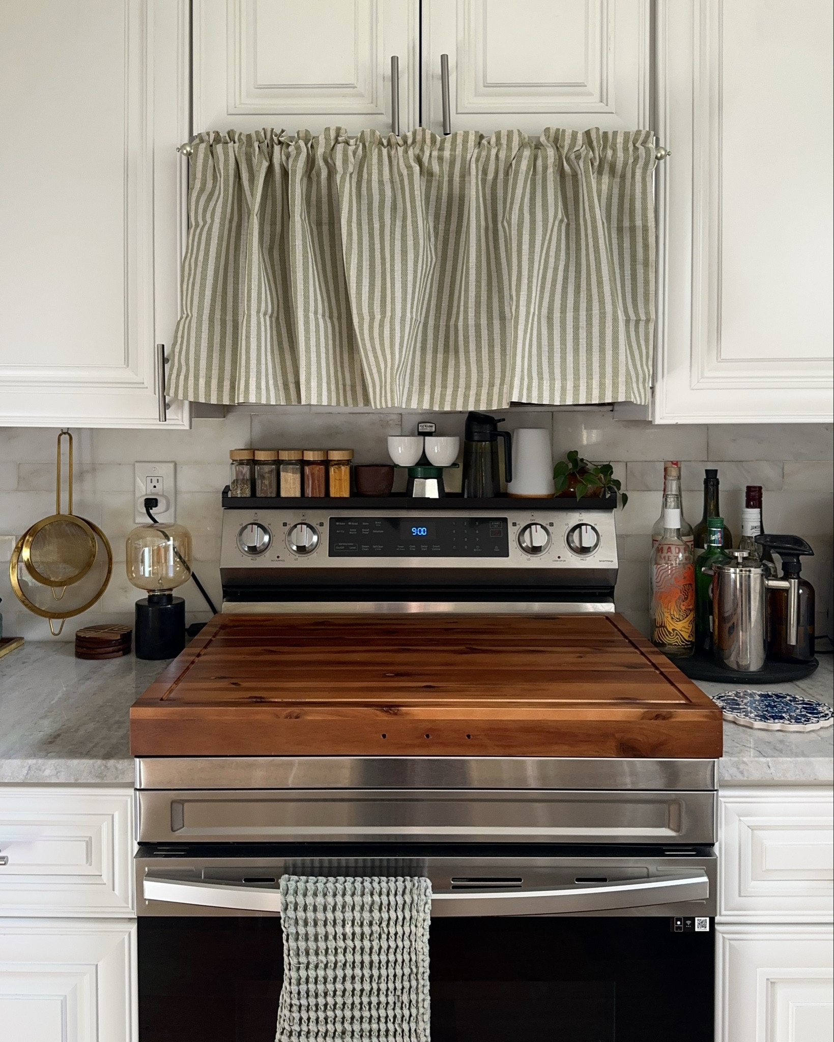 new additions to the kitchen, to hide the microwave & protect the oven from scratches! 💚 

#LTKSaleAlert #LTKFindsUnder50 #LTKHome