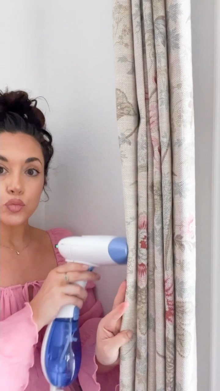 Curtain Training 
I started doing this to all our curtains to give them a uniform and crisp look and I love it! Here are a few helpful tips for you when getting new curtains
1. After hanging them steam out any wrinkles
2. Steam into “pleats” or “rows”. They will easily go into proper form for you after they have been hung by rings.
3. After you finish the entire curtain pinch together and steam a little more.
4. Tie with a ribbon into place to help set the curtains. You can leave this for as little or as much time as you want. I like to leave mine at least overnight.
5. Untie and enjoy!
Tip: If the tie made a small crease you can steam that out in just a few seconds and your good to go!
And now we are one step closer to finishing the living room! Like & Follow for more home decor tips & tricks 🏡


#LTKhome