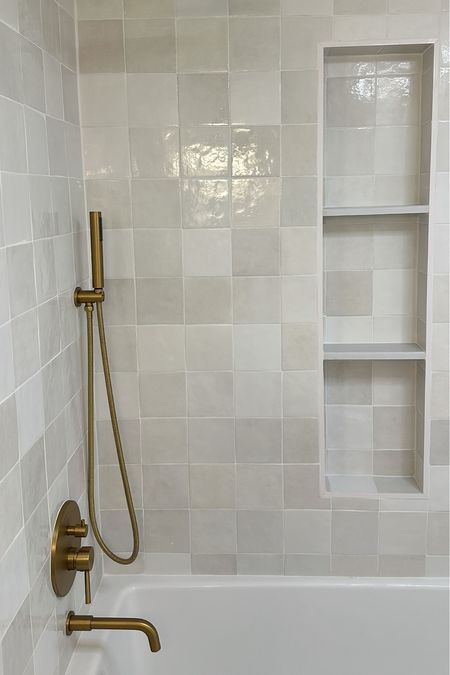 My tub shower system & tile 🛁 Also linked is the size niche that was used ✨

#LTKhome