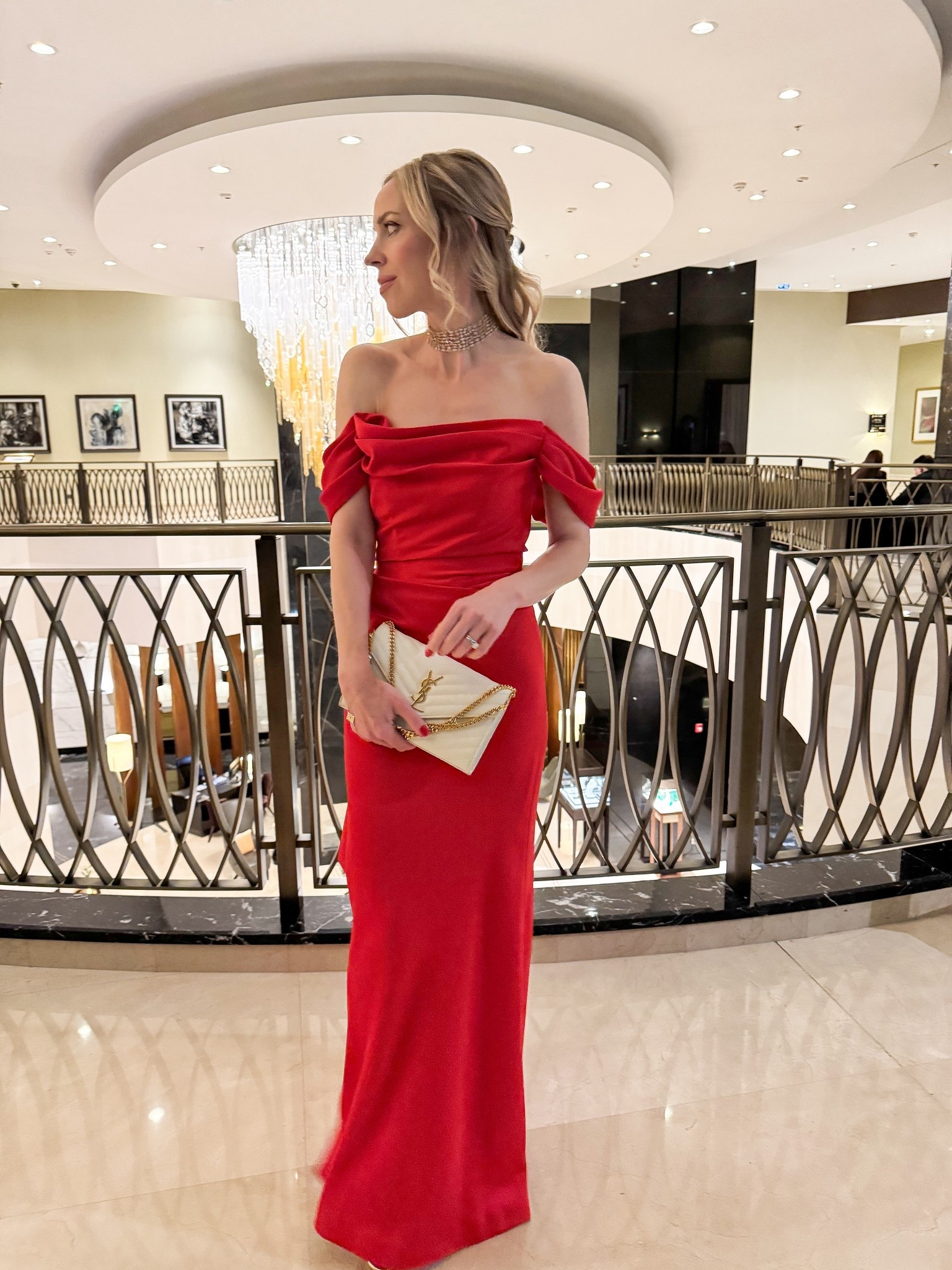 Red evening gown, off the shoulder dress, evening wear, holiday party, winter wedding guest, gold sandals, Saint Laurent clutch 

#LTKHoliday #LTKItBag #LTKWedding